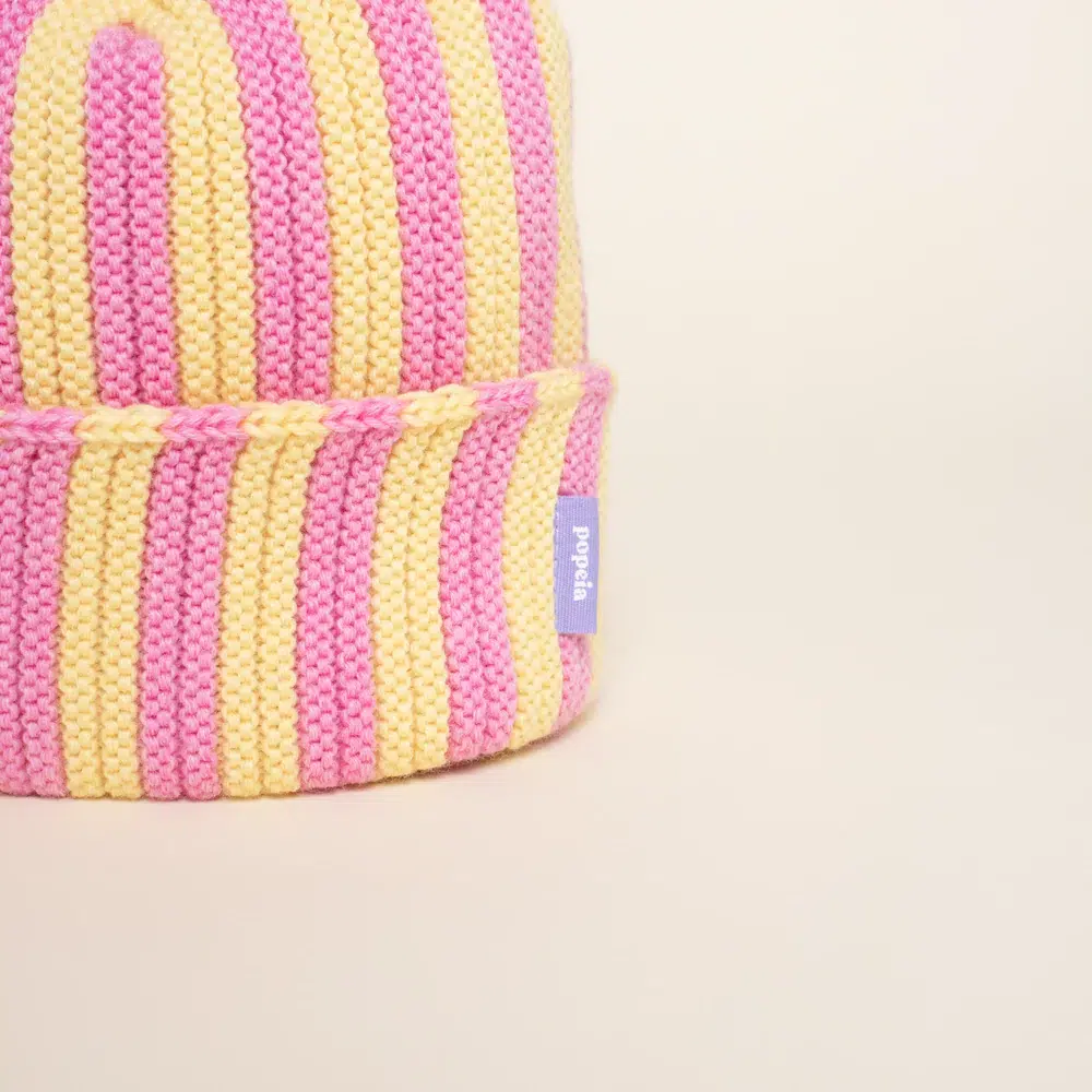 Popeia Mütze aus Merinowolle Hellgelb Pink Popeia Mütze aus Merinowolle Hellgelb Pink
